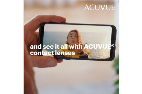 Image of someone at a beach on a phone screen, go have an adventure with ACUVUE contact lenses.